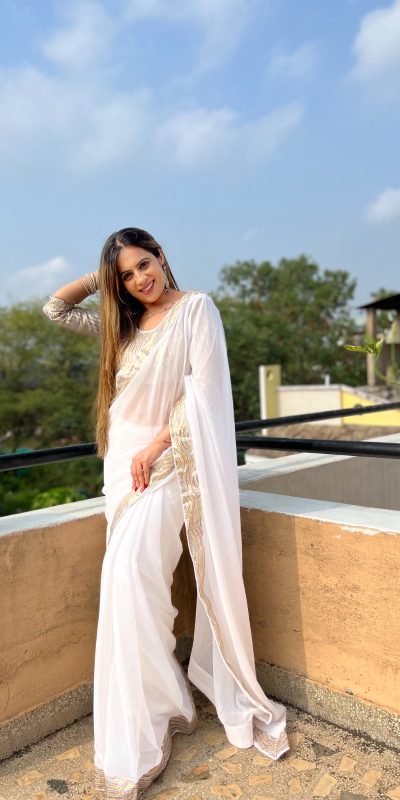 Glamorous White Color Georgette Heavy Sequence Work Saree