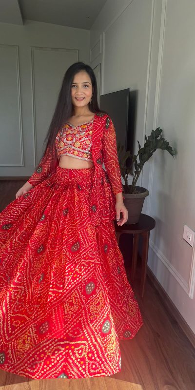 Commitment Red Color Pure Bandhrej Heavy Embroidery Sequence Lehenga Choli