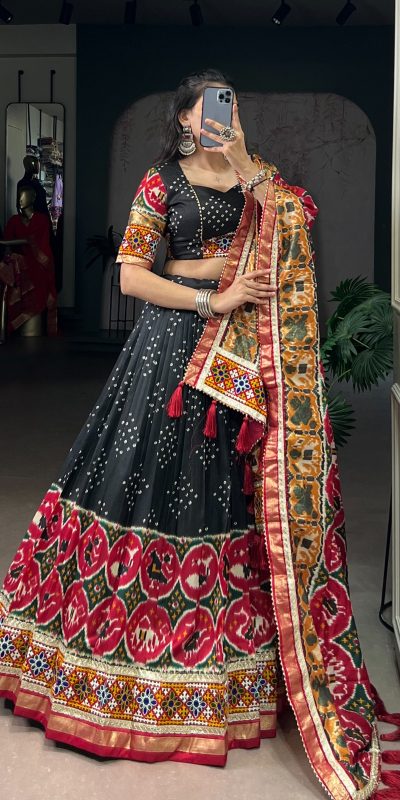 LNB 1734 Black Tasar Silk Gamthi Work With MirrorWork Lehenga Choli Introductory Price ₹2999. Delivery 4-6 Working Days. Shop now. | Lehenga, Bollywood Lehenga, Creative Lehenga, Designer Lehenga, Embroidered Lehenga, Party Wear Lehenga