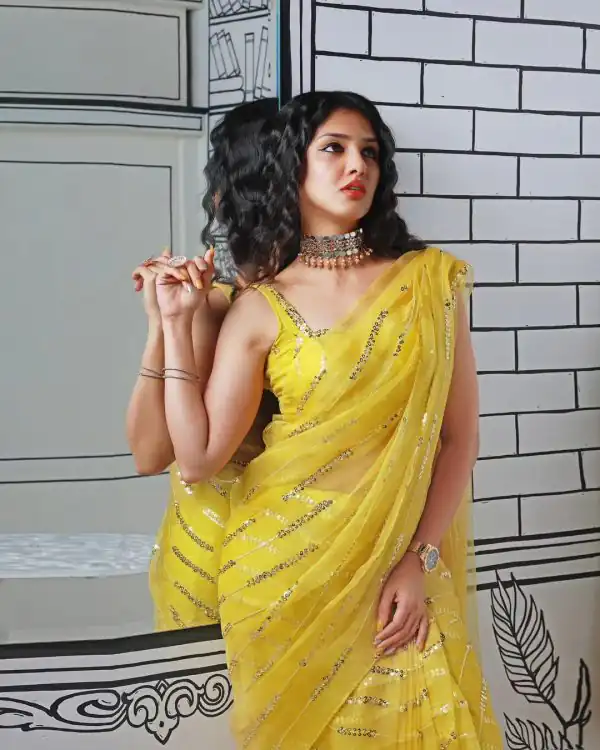 Peaceful Yellow Georgette Embroidery Sequence Tassels Saree