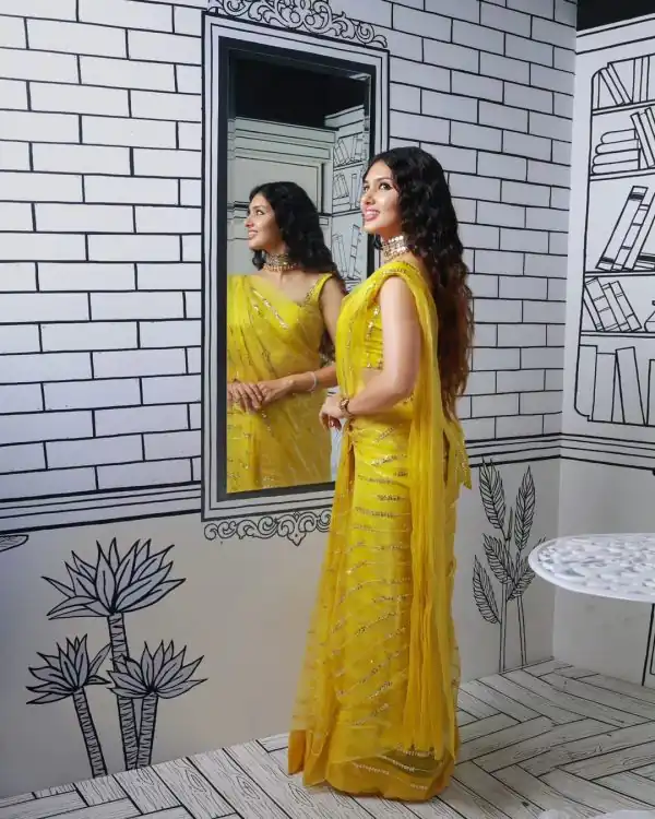 Peaceful Yellow Georgette Embroidery Sequence Tassels Saree