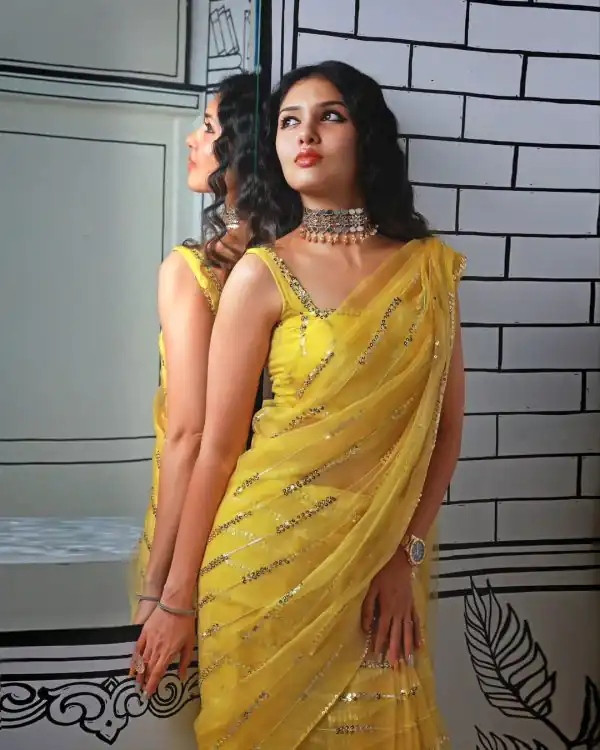 Peaceful Yellow Georgette Embroidery Sequence Tassels Saree
