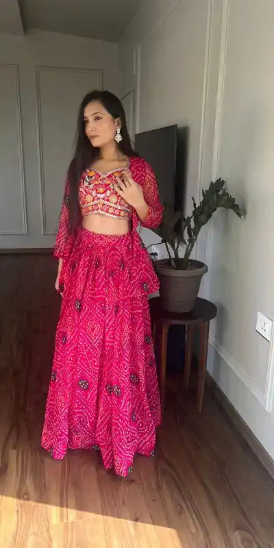 Commitment Pink Color Pure Bandhrej Heavy Embroidery Sequence Lehenga Choli