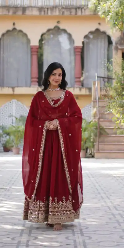 KA 1144 Maroon Faux Blooming Gown with Embroidery Work & Zari Work. Exclusive Offer ₹2449. Delivery 4-6 Working Days. Shop now. | Gowns, Bollywood Gowns, Creative Gowns, Designer Gowns, Embroidered Gowns, Party Wear Gowns