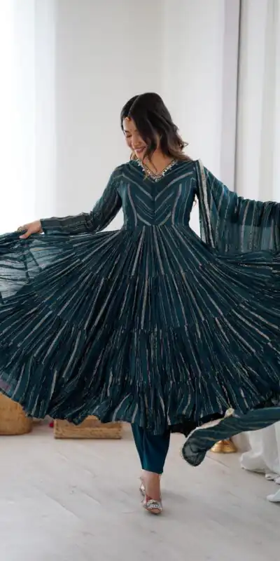 SRK 5305 Peacock Blue Color Mal Chanderi Gown with Mirror Work & Lace Work. Grab it for ₹2399. Delivery 4-6 Working Days. Shop now. | Gowns, Bollywood Gowns, Creative Gowns, Designer Gowns, Embroidered Gowns, Party Wear Gowns