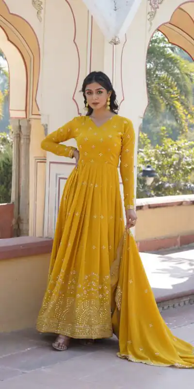 KA 1084 Yellow Faux Georgette Gown Perfect for Wedding, Party, Pooja, Festival Celebrations, Bridal Wear – . Festive Deal ₹2649. Delivery 4-6 Working | Gowns, Bollywood Gowns, Creative Gowns, Designer Gowns, Embroidered Gowns, Party Wear Gowns