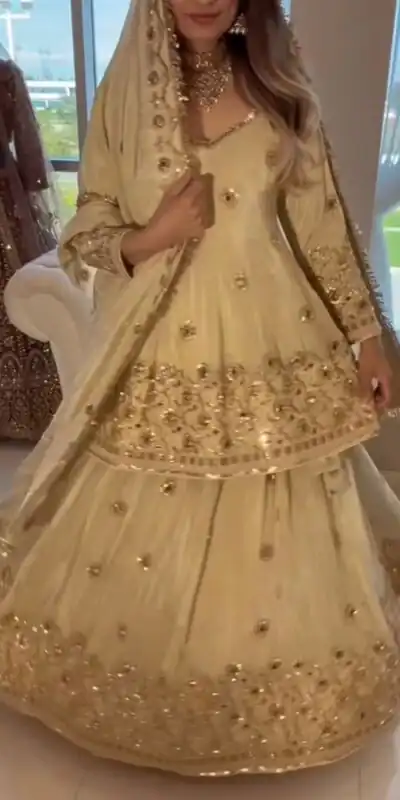 ST 1159 Cream Chinon Lehenga Choli with Embroidery Work & Mirror Work. Grab it for ₹2549. Delivery 4-6 Working Days. Shop now. | Lehenga, Bollywood Lehenga, Creative Lehenga, Designer Lehenga, Embroidered Lehenga, Party Wear Lehenga