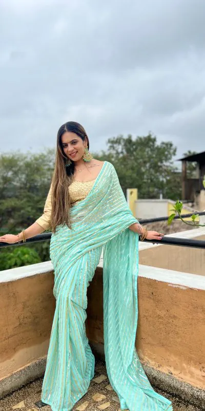 Glamorous Sky Blue Color Georgette Sequence Work Saree