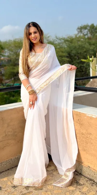 Glamorous White Color Georgette Heavy Sequence Work Saree